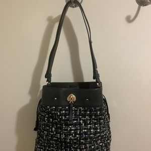Kate Spade Bag in excellent shape.  Plaid (Black, Blue)Adjustable Strap.